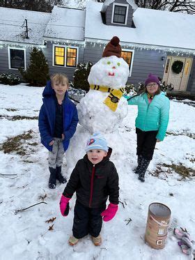 Residents find the joy in snow, a Snowman collection has begun ...