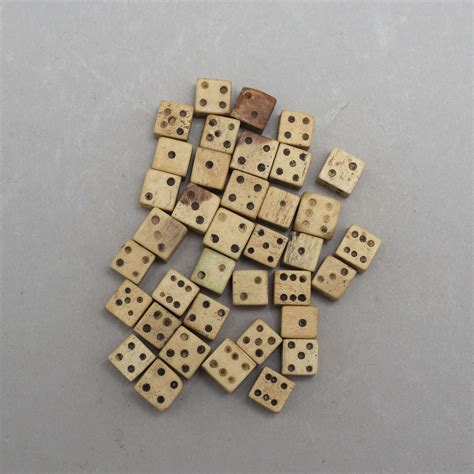 A set of 37 19th century miniature bone dice. - Bukowskis