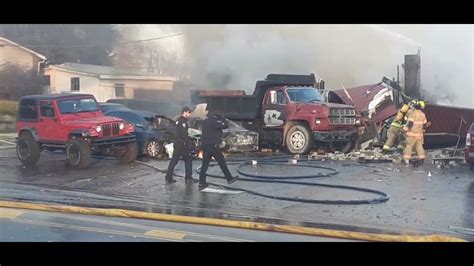 local car shop explodes with workers inside. - YouTube