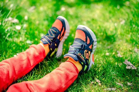 Kids legs in bright sneakers on the grass - Free Stock Photo Download ...