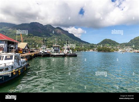 Port Victoria on Seychelles island mahé with mountain range in the ...