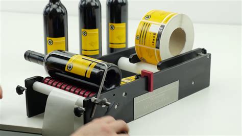 Wine Bottle Labeller - Wine Bottles being Labelled on the BenchMATE Label Applicator - YouTube