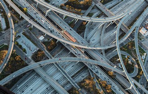 Aerial view of highway interchange in cityscape - Stock Photo - Dissolve