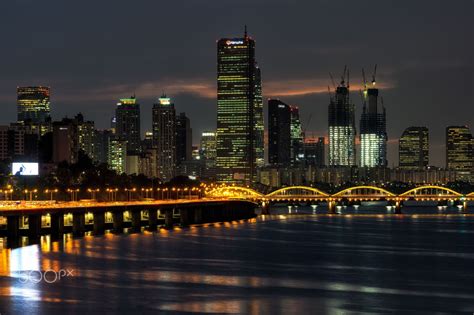 63 building over han river at night - Yeouido island and hangang bridge illuminated at night ...