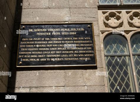 A plaque honoring Dr. Norman Vincent Peale in front of the Marble Collegiate Church of Fifth ...