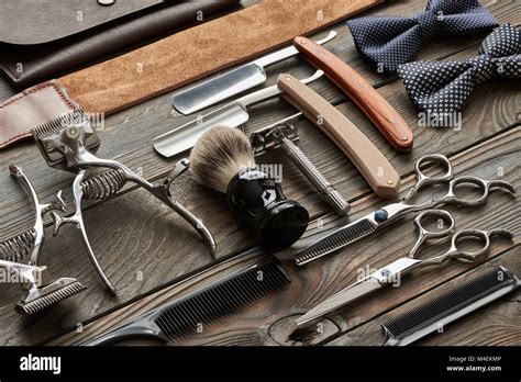 Vintage barber shop tools on wooden background Stock Photo - Alamy