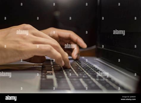 Hands on laptop keyboard, close up of hands on keyboard Stock Photo - Alamy