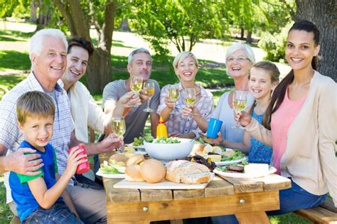 Premium Photo | Happy family having picnic in the park