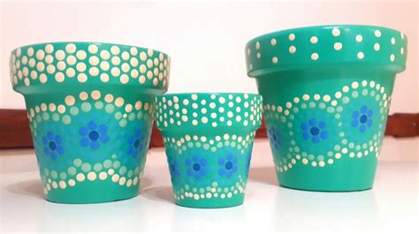 Caribbean green hand painted flowerpots. Macetas pintadas a mano. Verde caribe. Facebook: A'cha ...