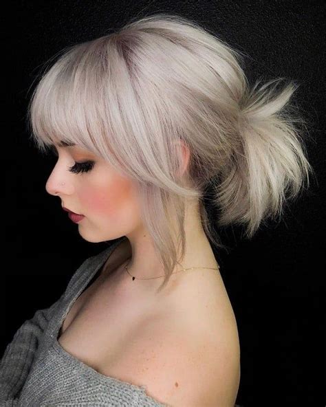 Ponytail with bangs: 21 styles to turn drab to fab | Platinum blonde hair, Short hair ponytail ...