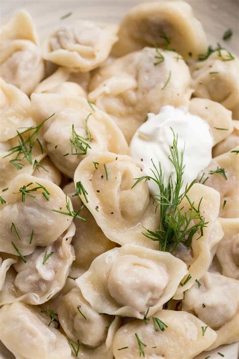 A classic Russian Pelmeni recipe. Meat dumplings made with a soft dough and filled with meat ...