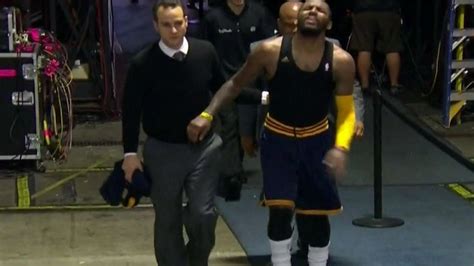 Kyrie Irving injury: Cavaliers star limps off in overtime vs. Warriors ...