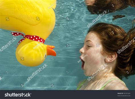 Little Girl Playing Underwater Large Yellow Stock Photo 56791642 | Shutterstock