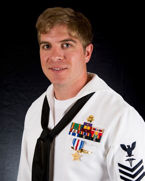 Navy Petty Officer 1st Class Kevin D. Baskin, a special amphibious reconnaissance corpsman ...