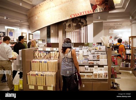 Tourists shopping in the gift shop, The National Archives, Washington ...