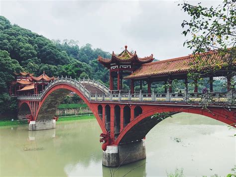 Picturesque Bridge in China Creates Serenely Symmetrical Reflection in Water