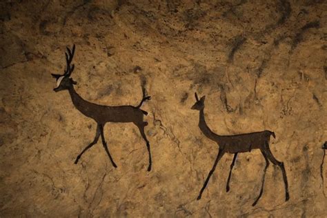 a cave painting of a deer and a 1 9 5 0 s sci - fi | Stable Diffusion