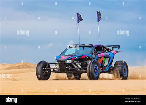 Sand Buggy racing in the sand dunes of the Qatari desert Stock Photo - Alamy