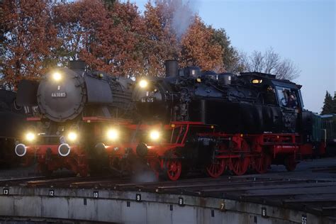 Two German steam locomotives at dusk : r/TrainPorn