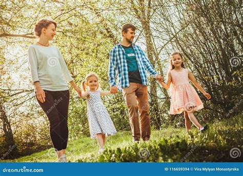 Happy family outdoors stock photo. Image of enjoying - 116659394