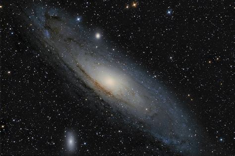 Andromeda Galaxy M31 and its satellite galaxies M32 and M110 in Andromeda constellation ...