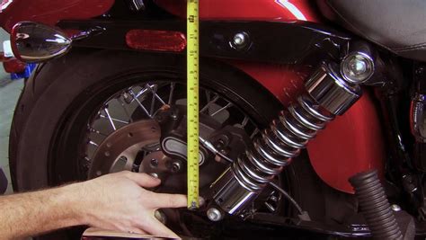 How to Adjust Rear Shocks on a Harley Davidson Dyna