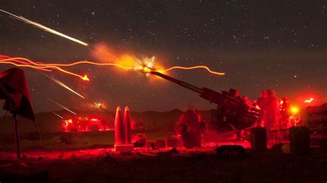 Check Out This Awesome Image of the US Marines Firing Artillery At Night