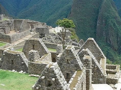 Inca houses at Machu Picchu in the Andes mountains.