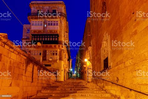 Valletta Old Medieval Street At Night Stock Photo - Download Image Now ...