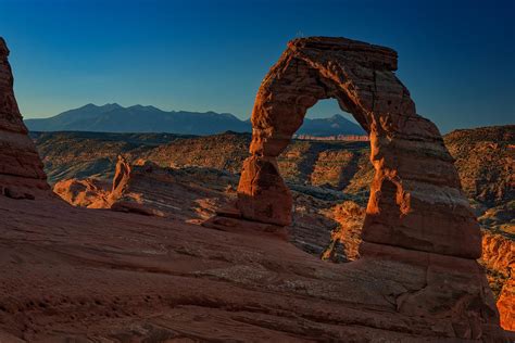 Delicate Arch At Sunrise Photograph by Rick Berk