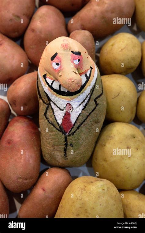 A funny, painted potato Stock Photo - Alamy