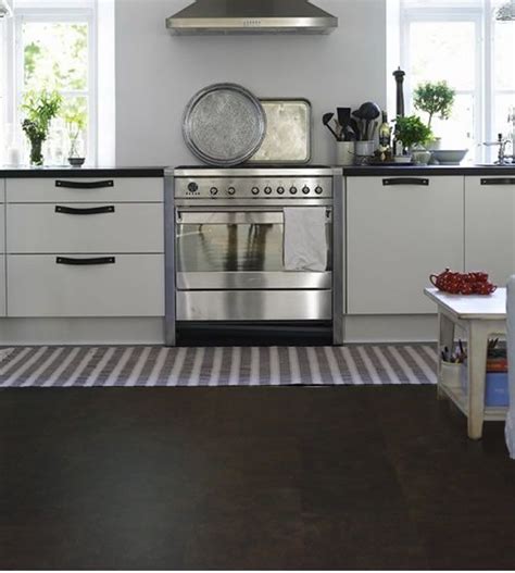 Dark Cork Flooring in a Kitchen Cork is an amazing flooring option on the market today. Cork can ...