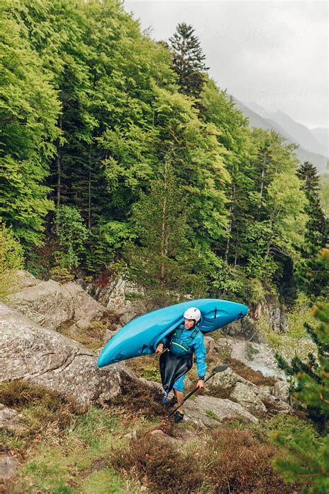 "Extreme Kayakers Into A River Creek" by Stocksy Contributor "Blue ...