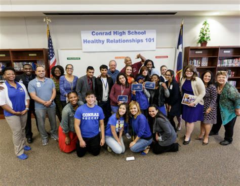 Group picture of Conrad High School students and teachers