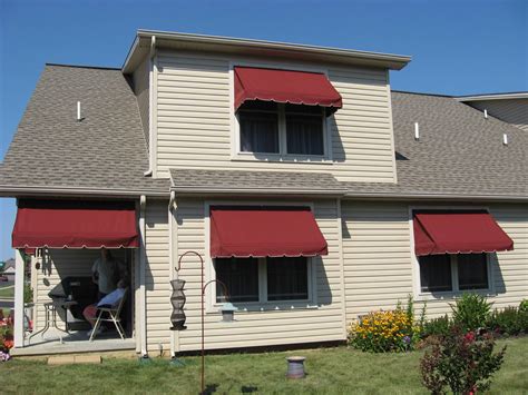 Window awnings - showing how the awnings provide shade for the whole window | Kreider's Canvas ...