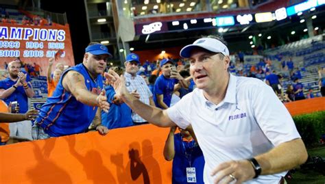 Florida Gators head coach Dan Mullen celebrates after his season debut ...