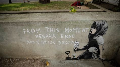 Possible Banksy artwork appears near London climate change protest ...