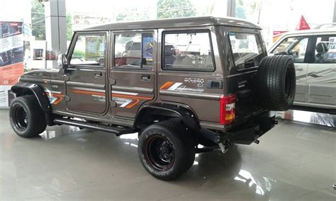 Modified Mahindra Bolero rear three quarter spied at a dealership