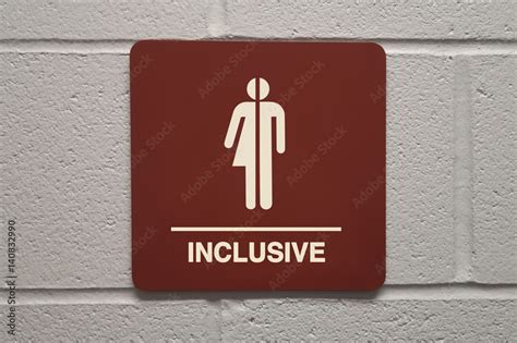 Gender neutral restroom sign that says, INCLUSIVE Stock Photo | Adobe Stock