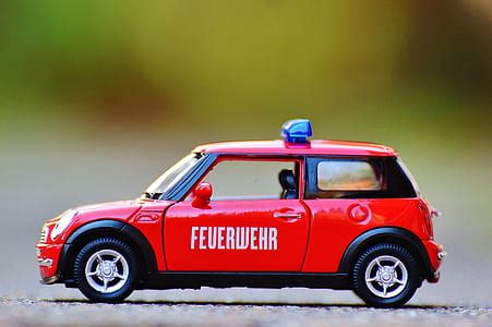 Royalty-Free photo: Red Mini Cooper scale model selective focal photo | PickPik