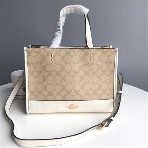 Authentic Coach Dempsey Carryall Bag, Women's Fashion, Bags & Wallets, Tote Bags on Carousell