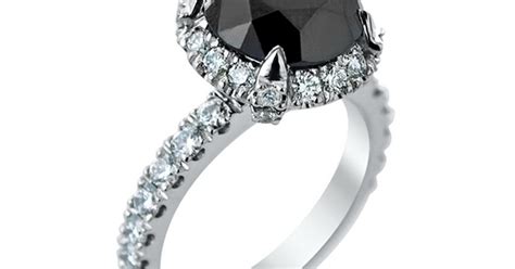 Black Round Diamond and White Diamond Halo Ring