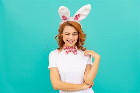 Happy Winking Easter Girl in Bunny Ears and Bow Tie on Blue Background ...