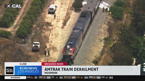 Amtrak train partly derails after colliding with truck - YouTube