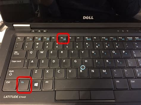 How do You Disable the TrackPoint Mouse Button on a Dell Laptop?