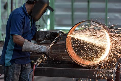 Metal cutting with acetylene torch Photograph by Sasin Tipchai - Fine Art America