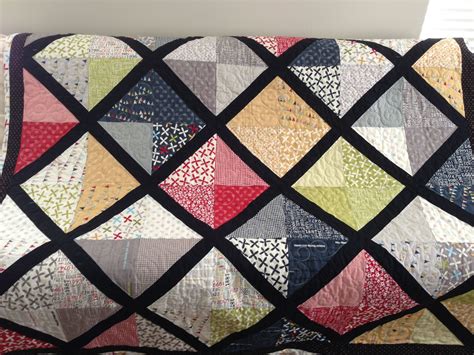 Lattice quilt | Charm square quilts, Quilts, Quilting half square triangles