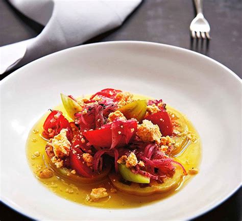 Tomato salad with sumac, shanklish and olive oil recipe | Gourmet Traveller