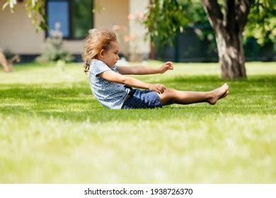 Active Little Girl Makes Somersault On Stock Photo 1938726370 | Shutterstock