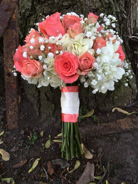 Bridal bouquet of coral roses, hydrangea and babies breath | Coral wedding flowers, Flower ...